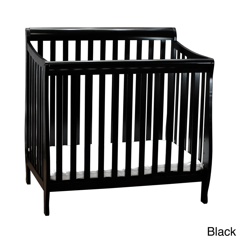 Mikaila Loren Pinewood Mini Crib With Mattress Pad