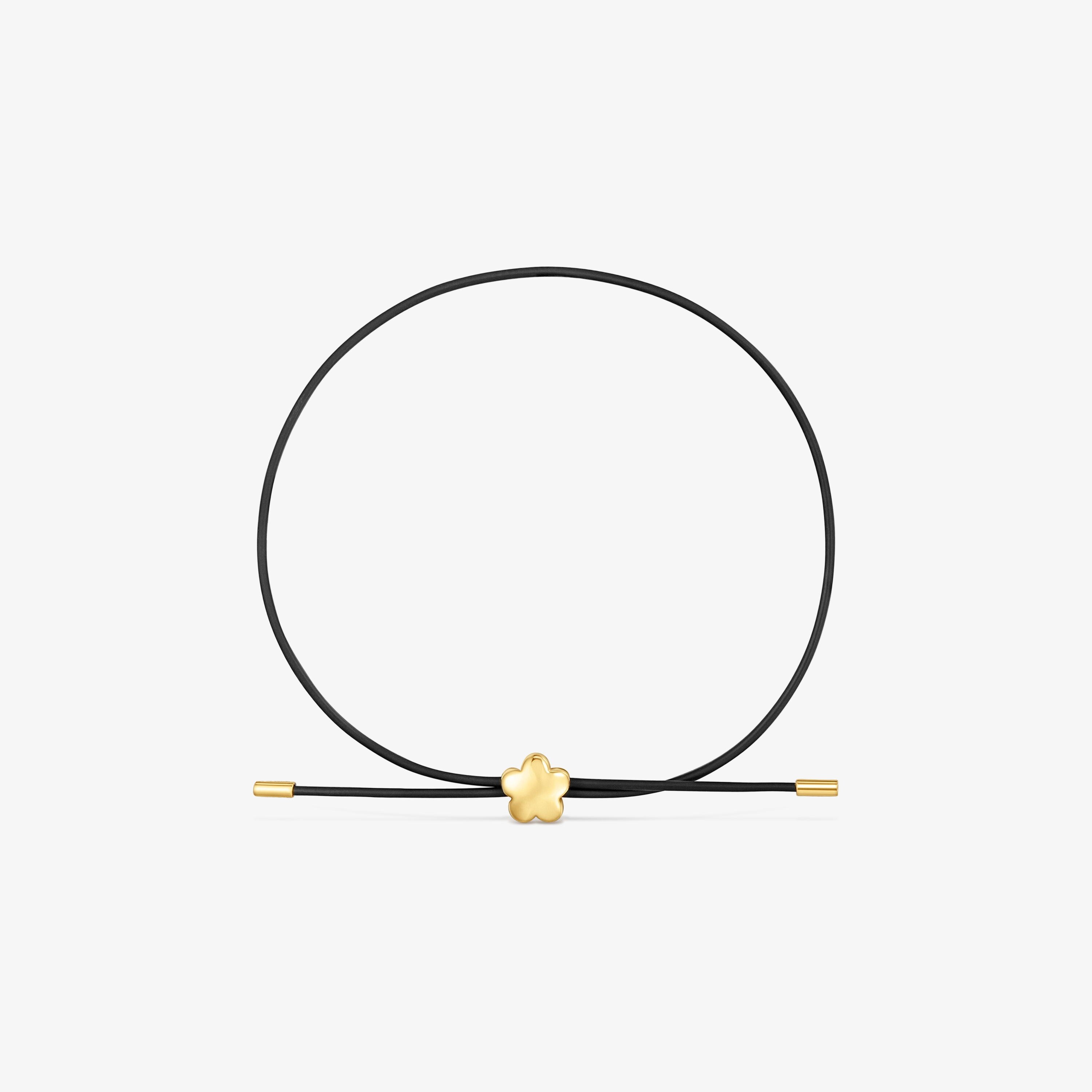 Pulsera flor de oro 14 kt y caucho Bold Motif