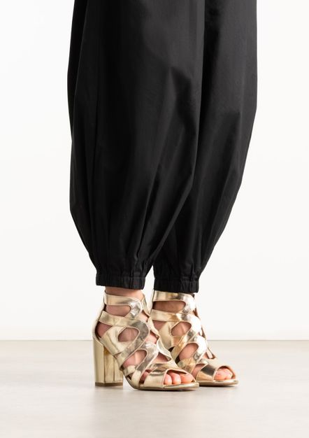 Gouden opengewerkte sandalen met hak