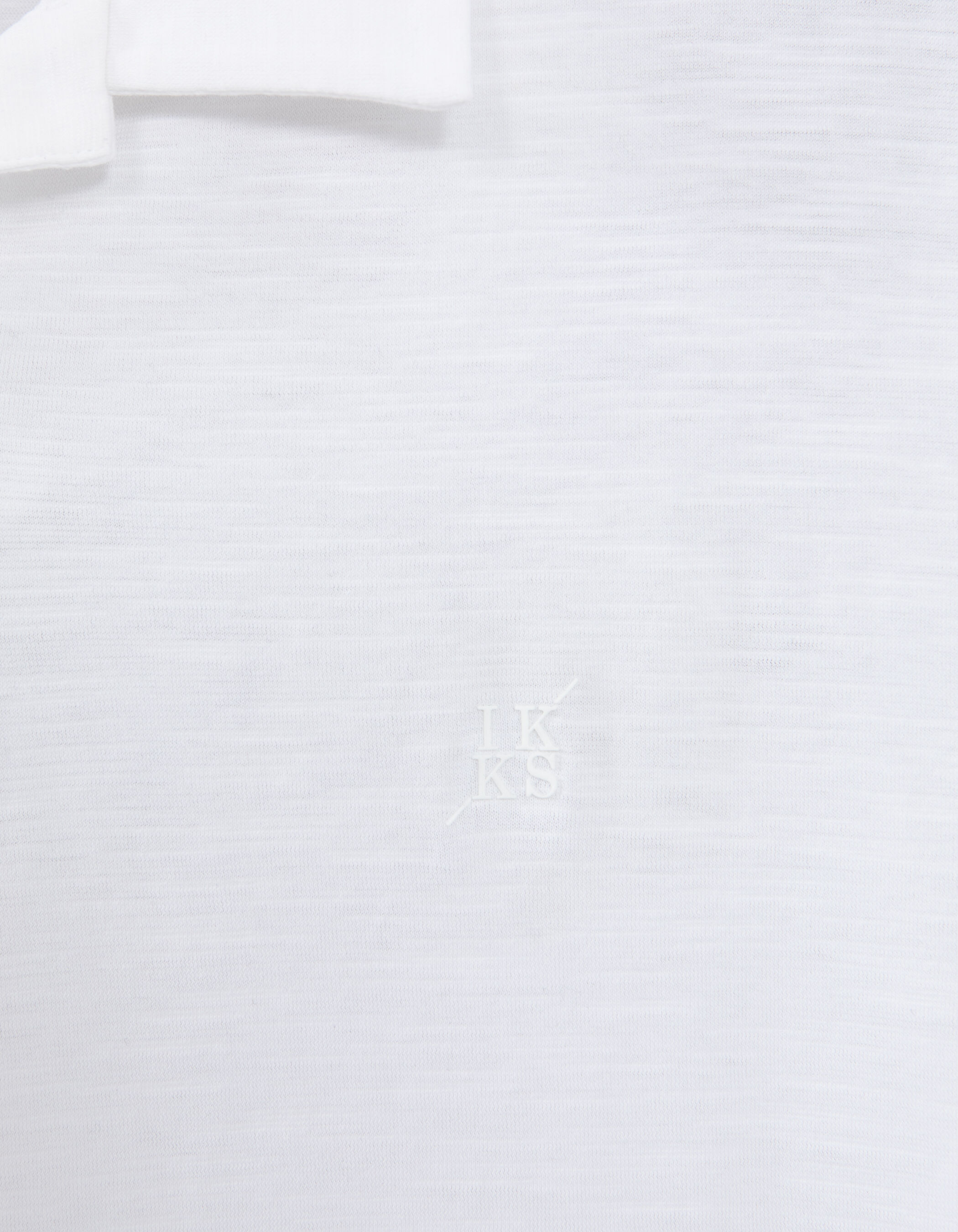 Polo blanc L'Essentiel coton bio flammé Homme