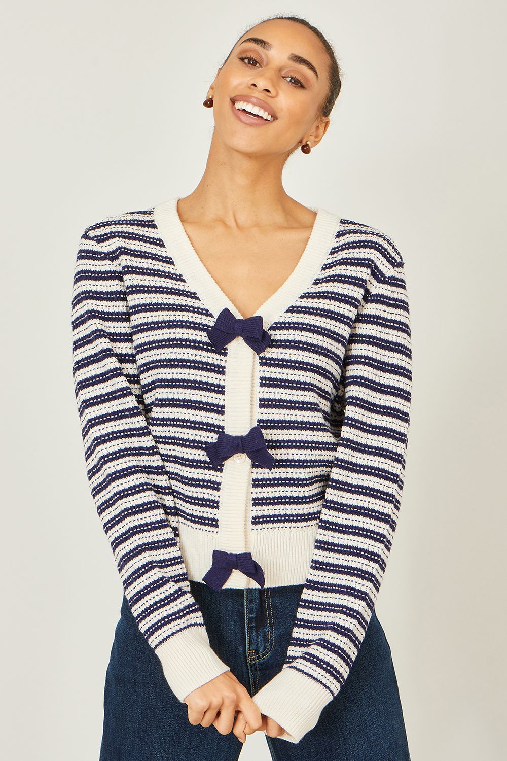 Yumi Cream and Navy Stripe Cardigan With Bow Detail