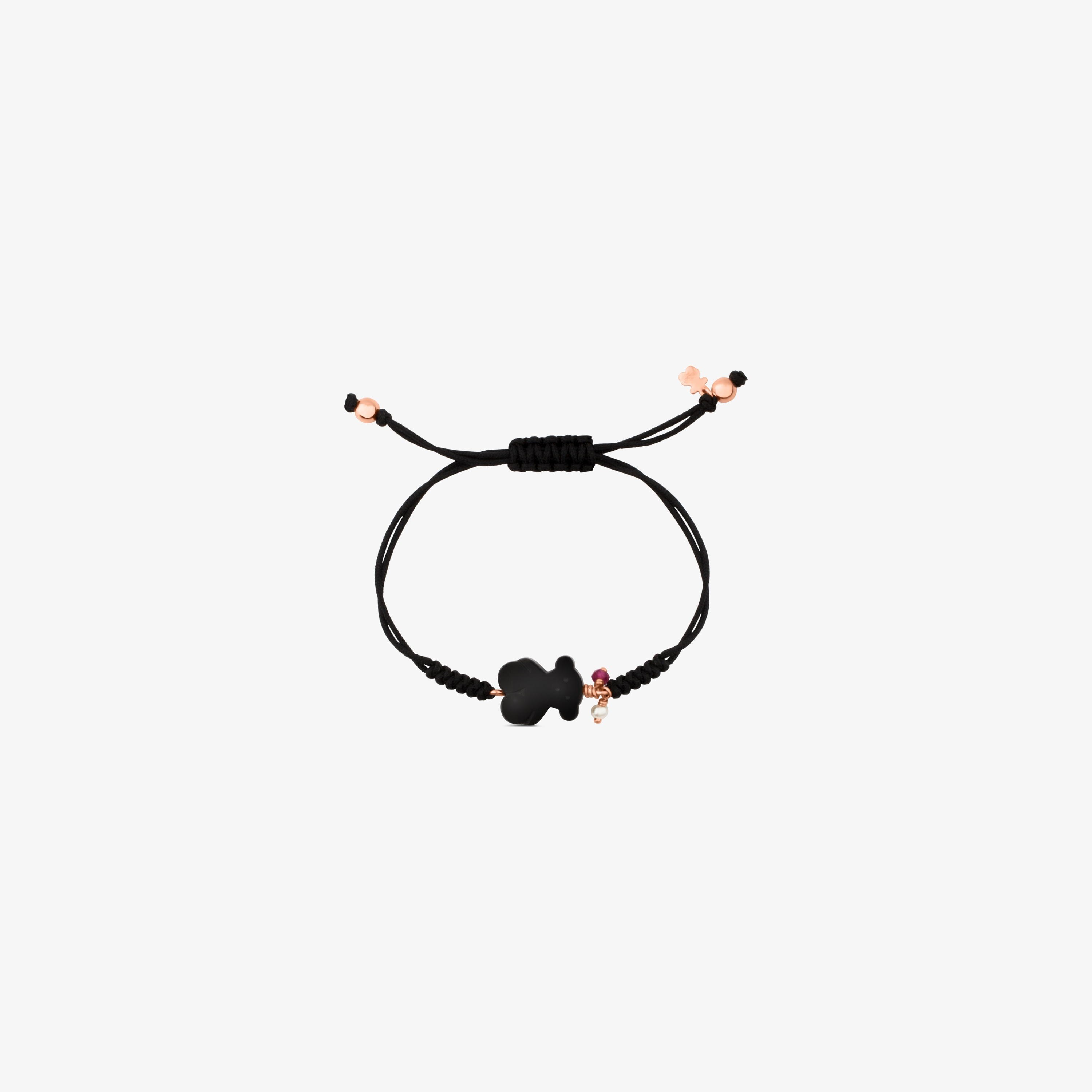 Pulsera con baño de oro rosa 18 kt sobre plata, gemas y cordón en color negro New Tibet