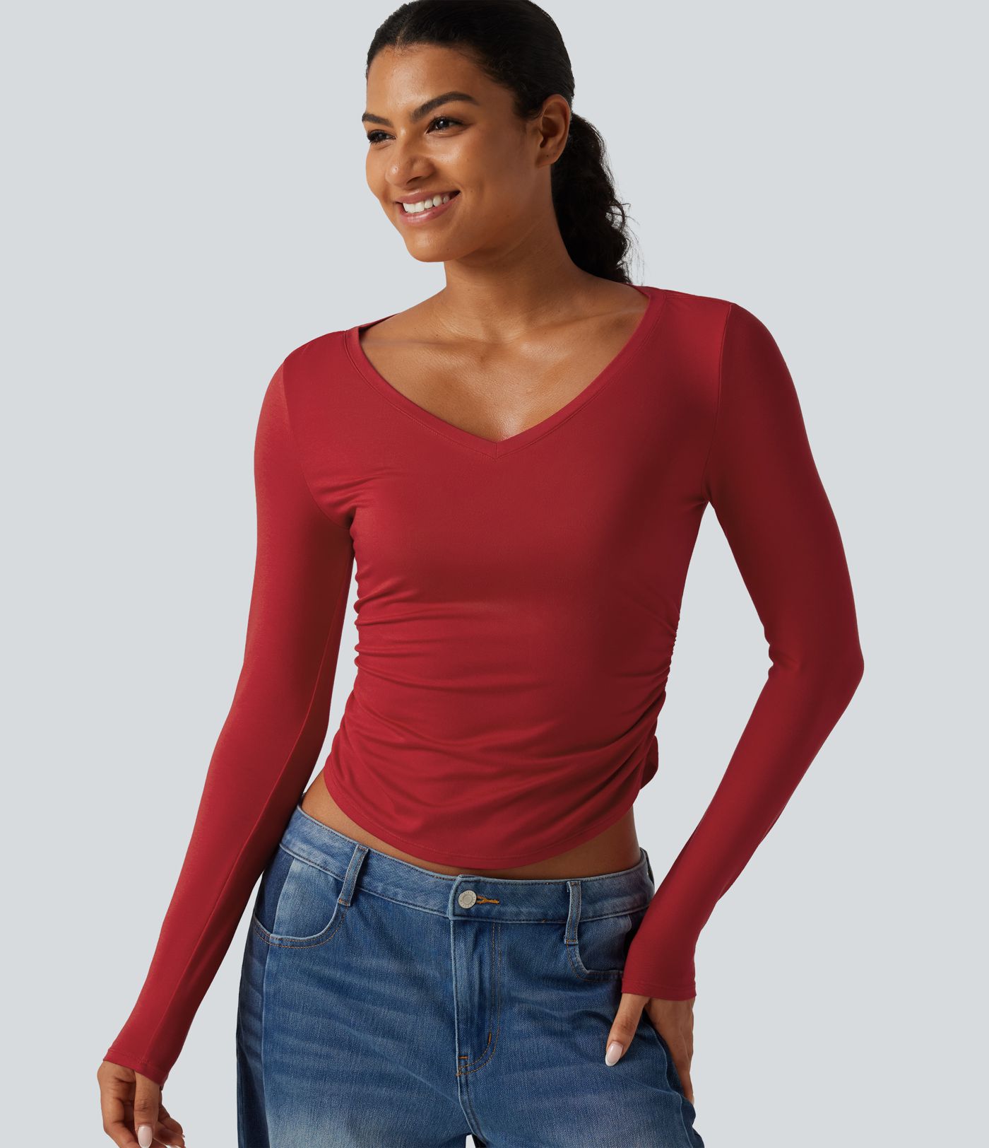 T-shirt à encolure en V, manches longues, ourlet arrondi et fronces