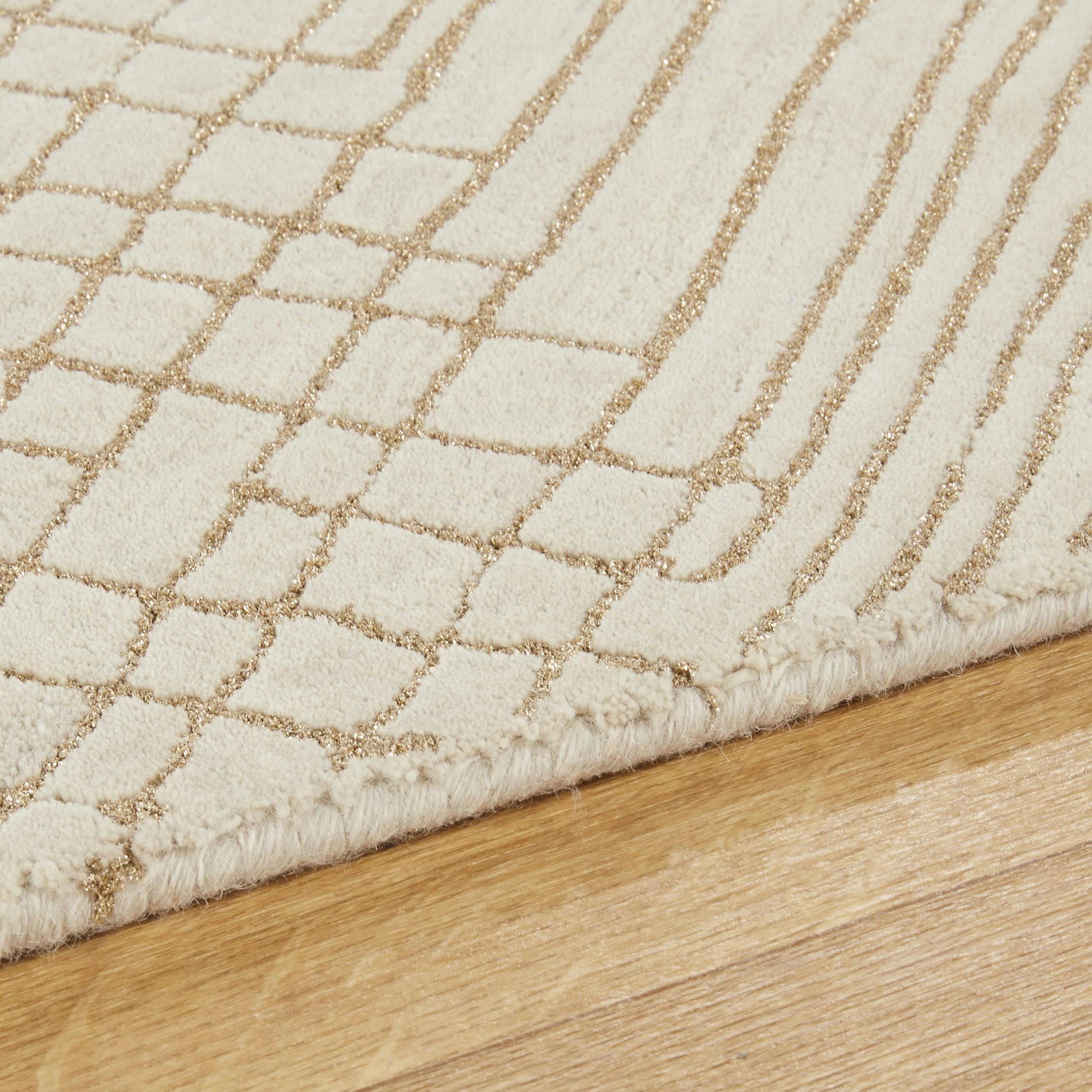 - Tapis en laine ciselée beige à motifs géométriques, 140x200