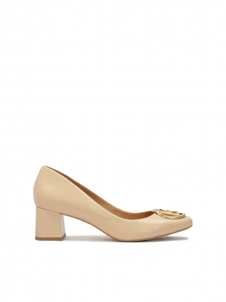Beige pumps with a wide heel