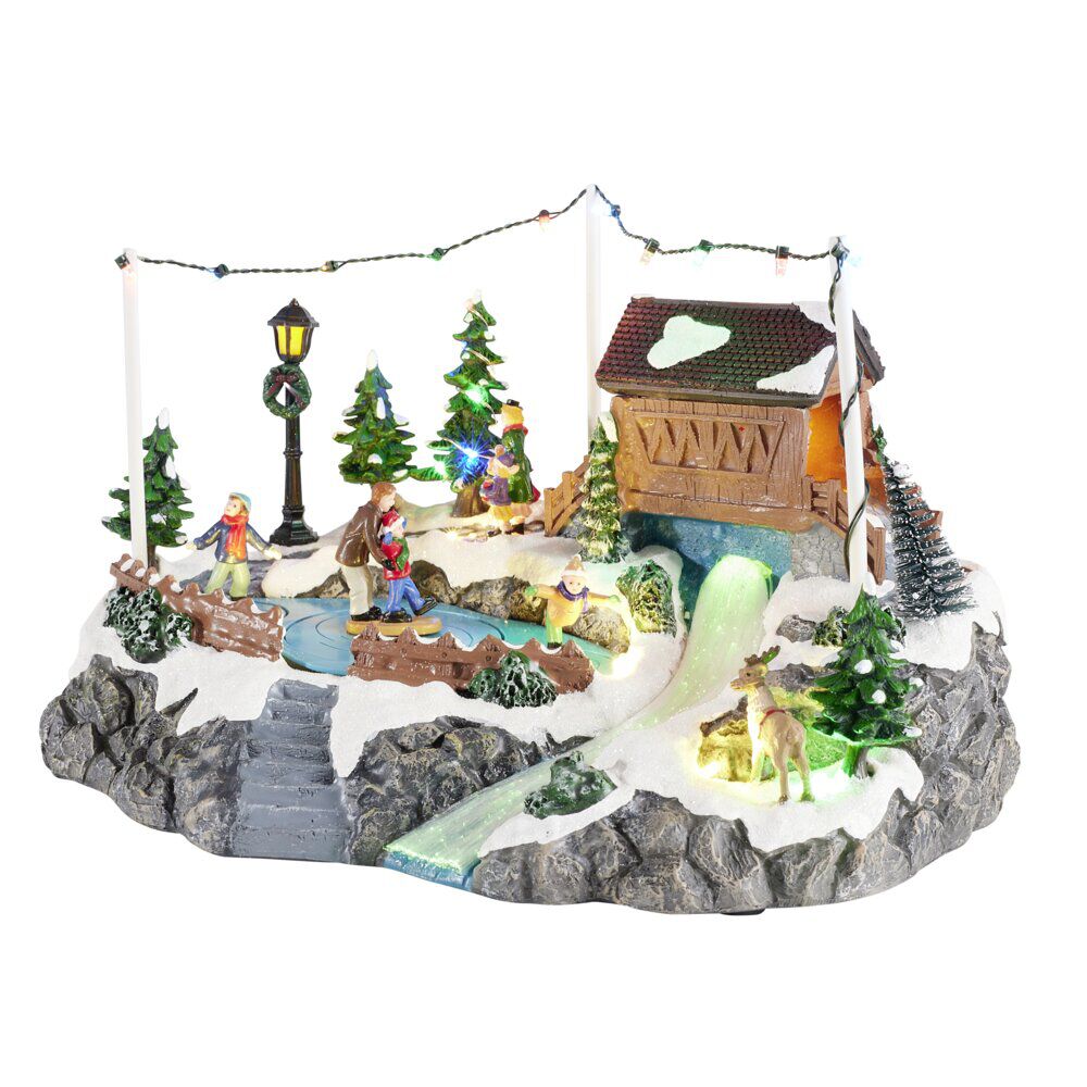 Village de No&euml;l animé LED et sa patinoire 32,5x22xH20cm