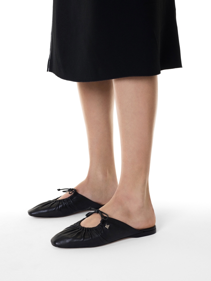 Black slides with decorative upper