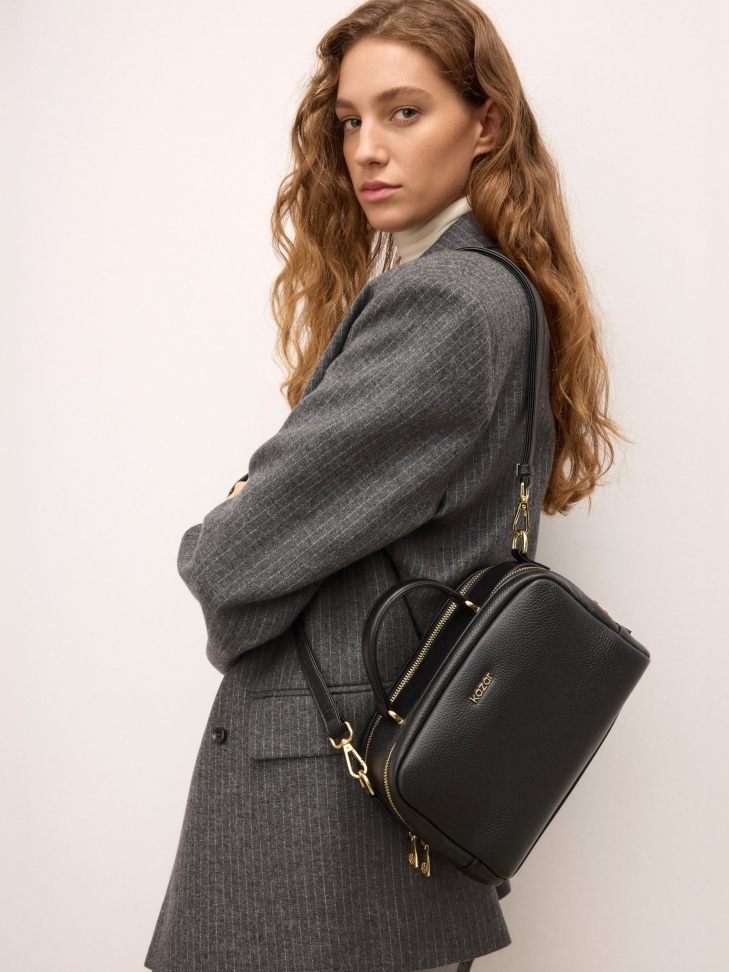 Leather handbag with a geometric shape