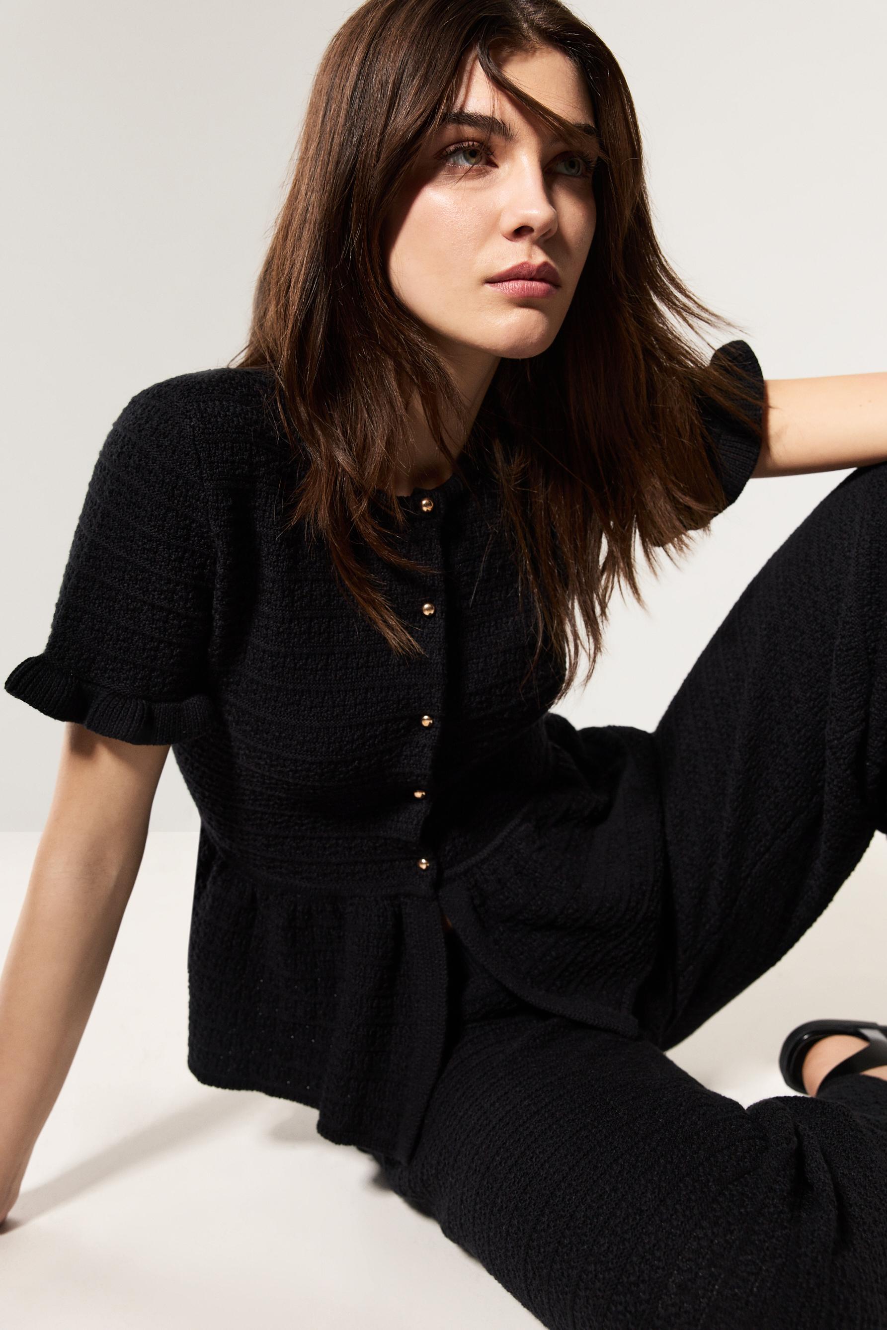 Chaqueta punto peplum
