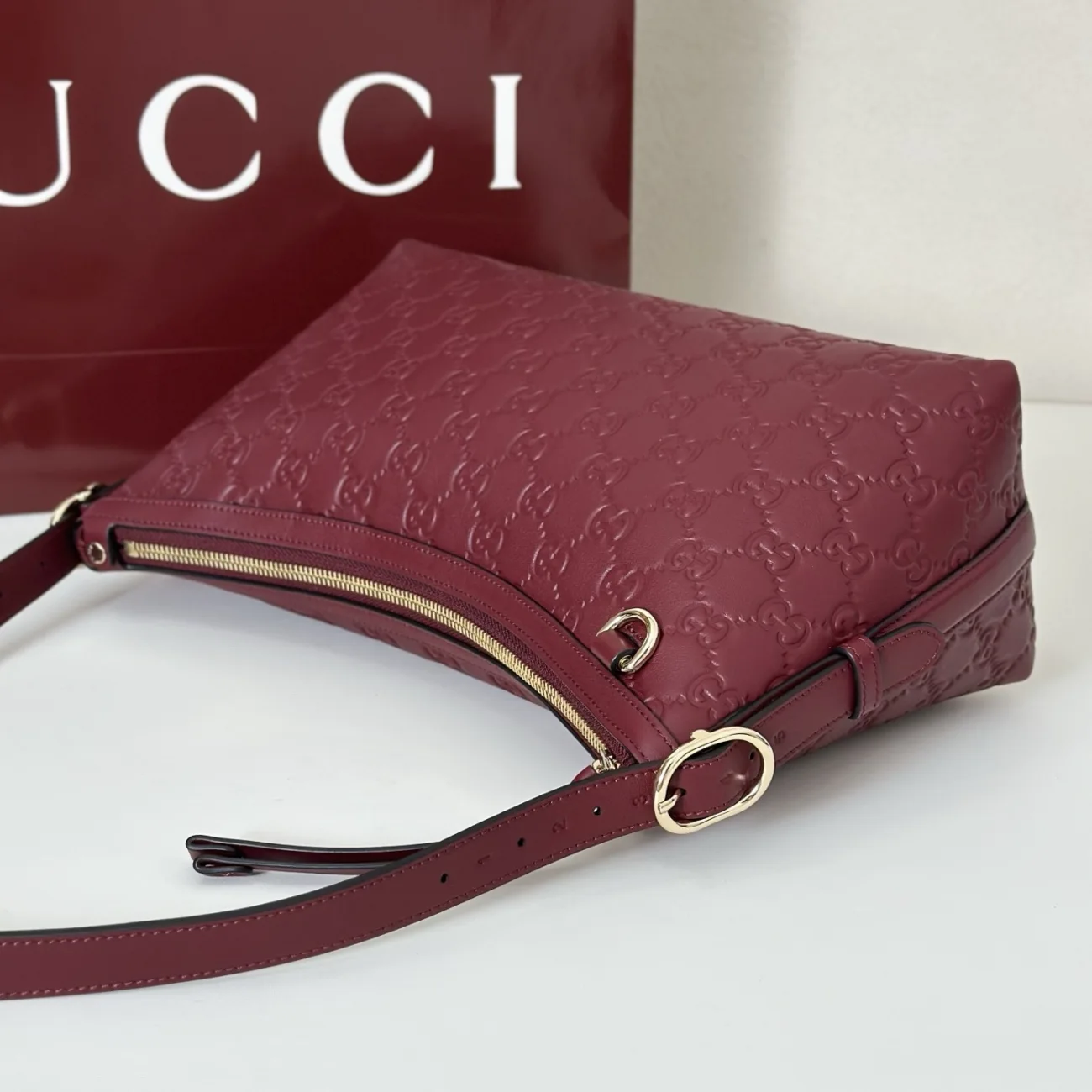 Gucci GG Emblem Medium Shoulder Bag in Leather