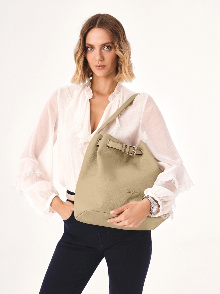 Beige bag-shaped handbag