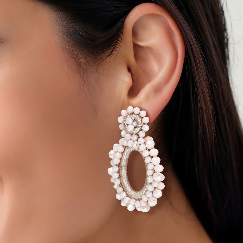 Manfield Licht roze glaskralen oorbellen