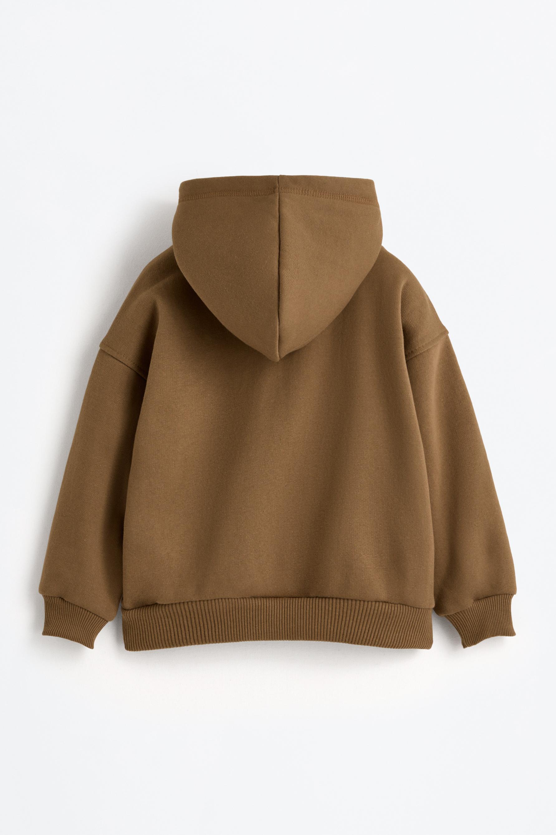 Sudadera bordada con capucha