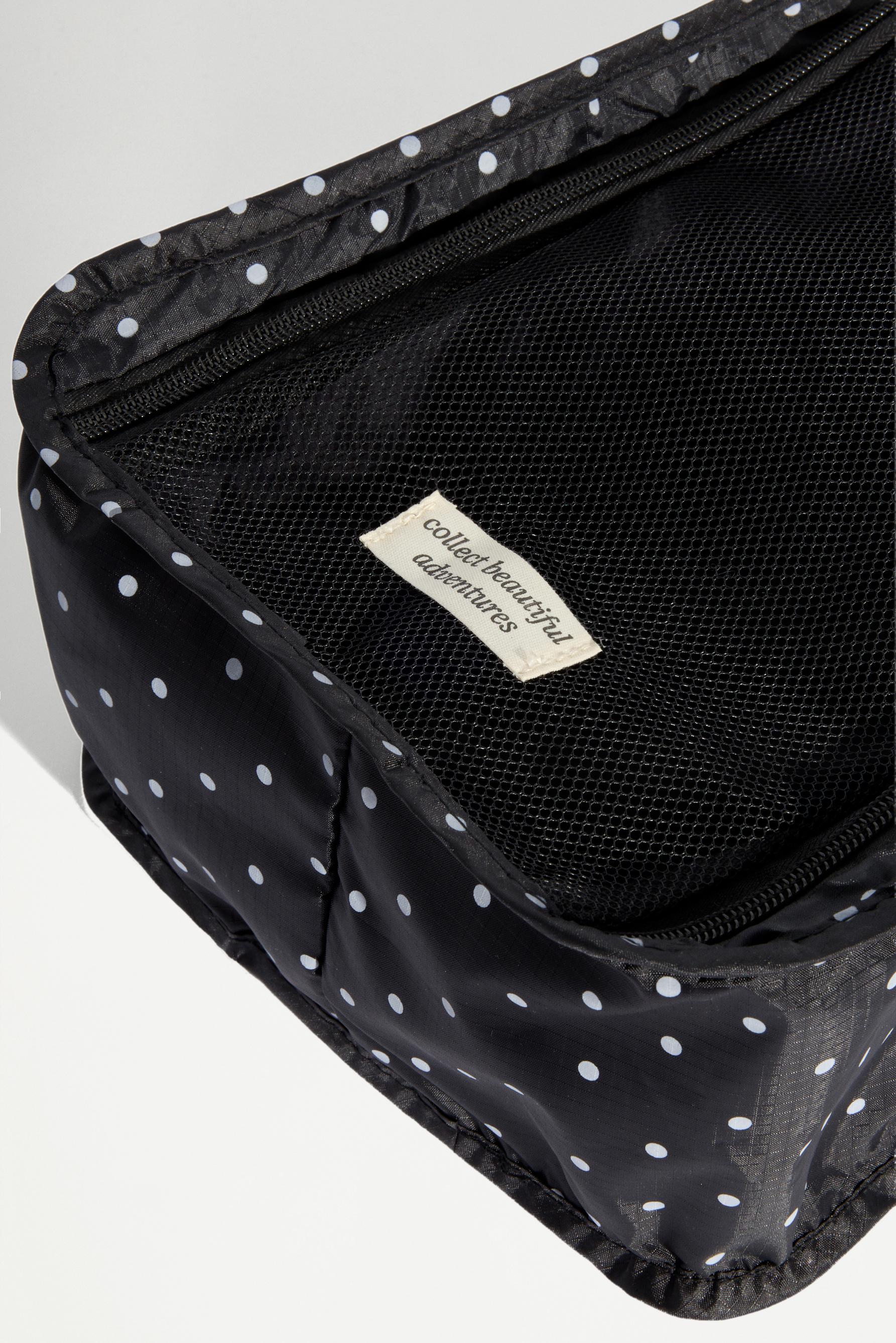 Organizador calzado viaje topos