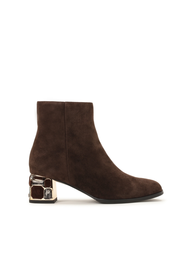 Brown suede booties with a beautifully decorated heel