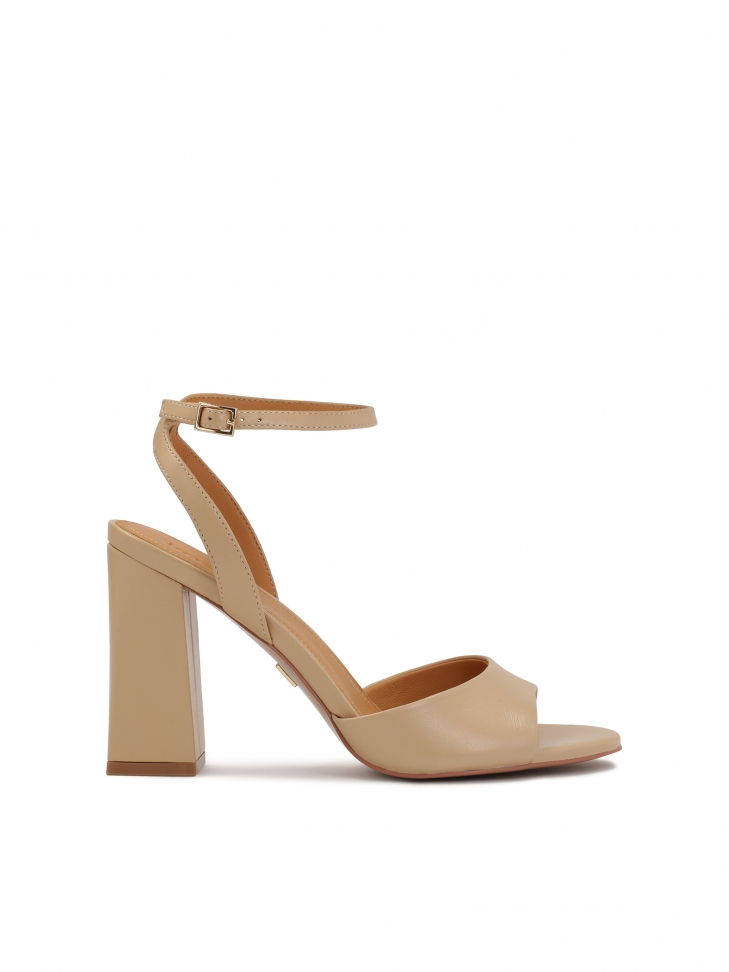 Classic beige sandals on a post