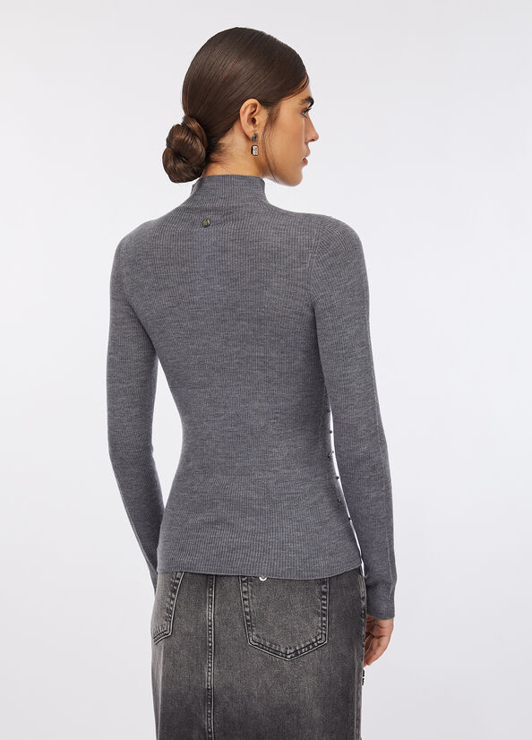 Maglia 100% lana con applicazioni