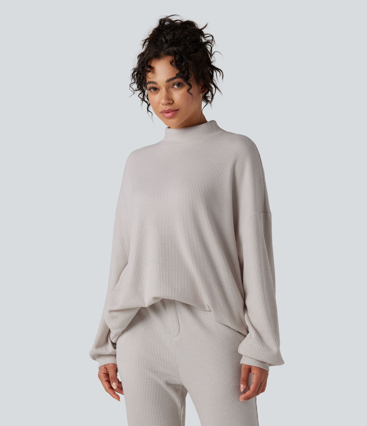 Sweat-shirt gaufré col montant manches longues coupe décontractée avec poches