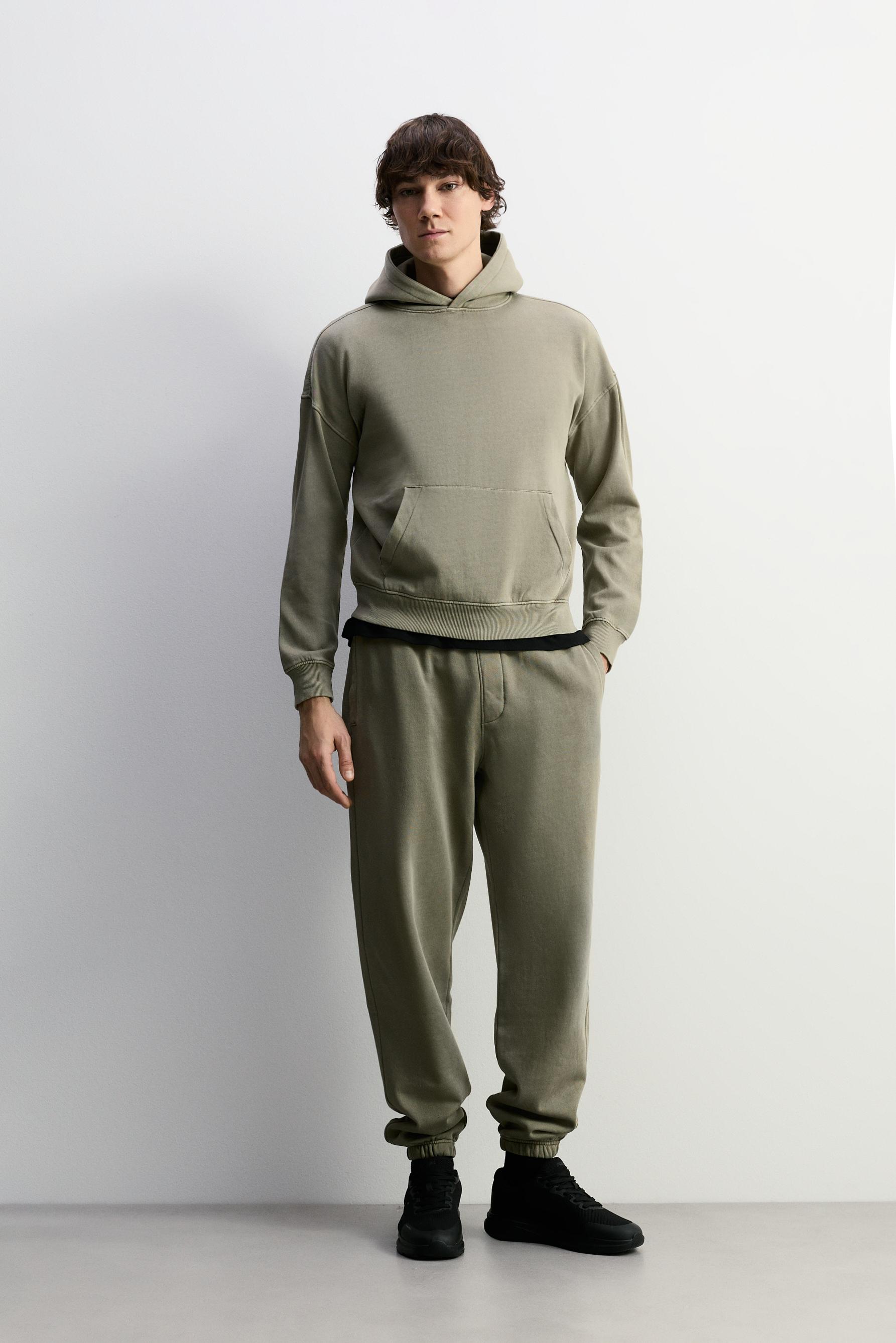 Sudadera efecto lavado capucha