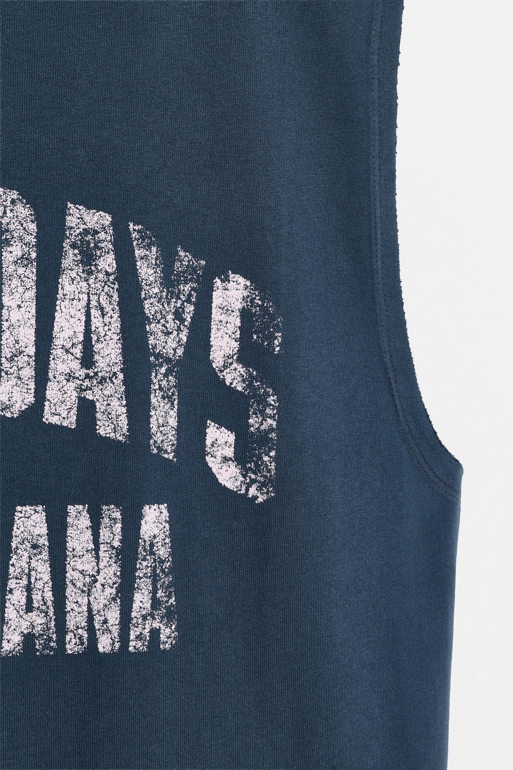 Camiseta tirantes texto efecto lavado