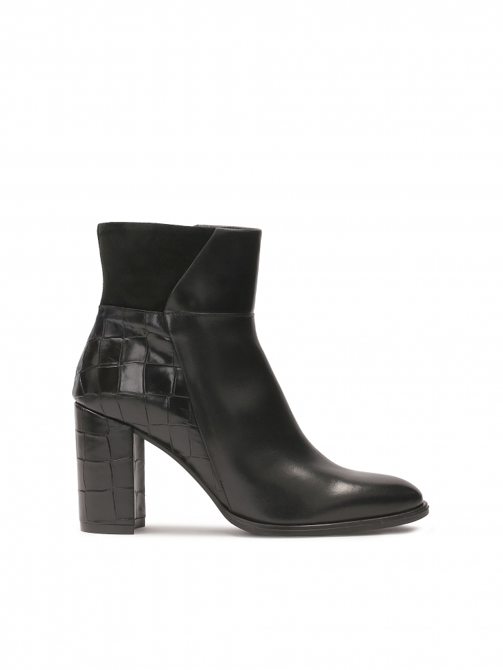 Black stiletto boots made of combined materials