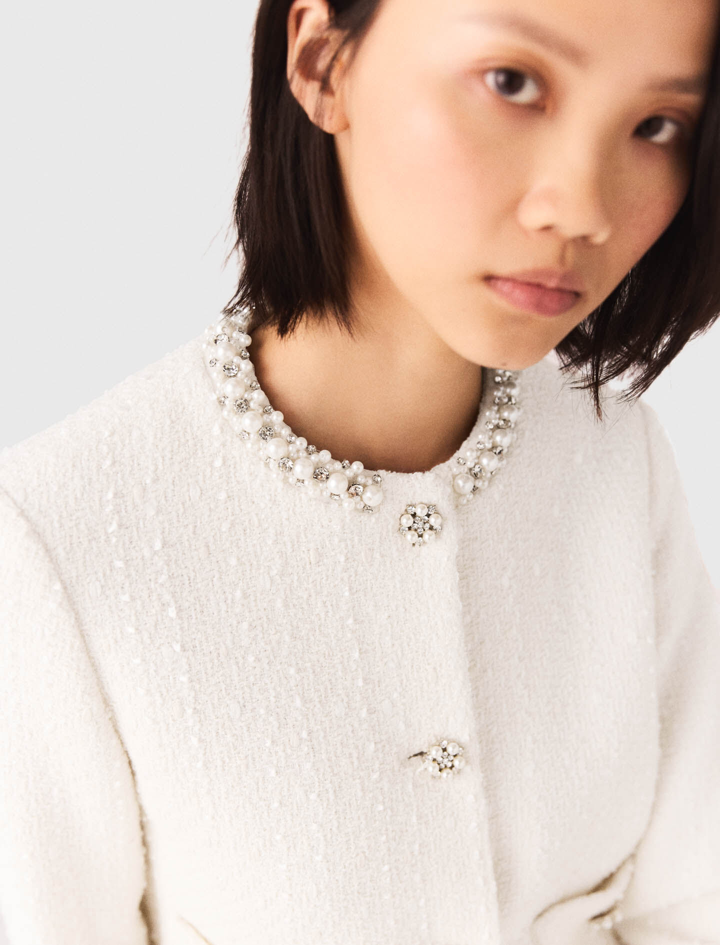 Veste en tweed et galon de perles