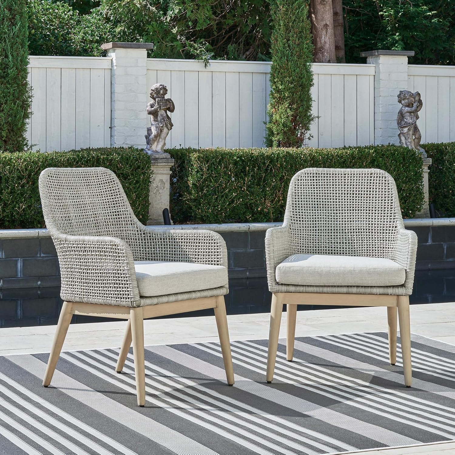 Signature Design by Ashley Seton Creek Cottage Nuvella Weather Resistant Fabric Outdoor Dining Arm Chair with Cushion, Set of 2, Light Brown & Light Gray