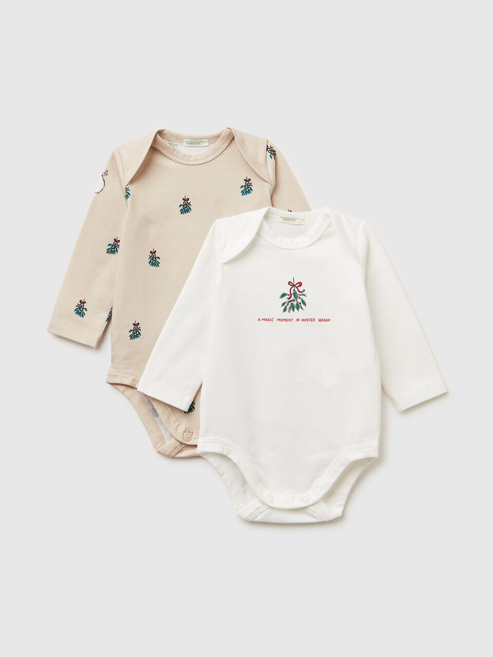 Two long sleeve ribbed knit onesies