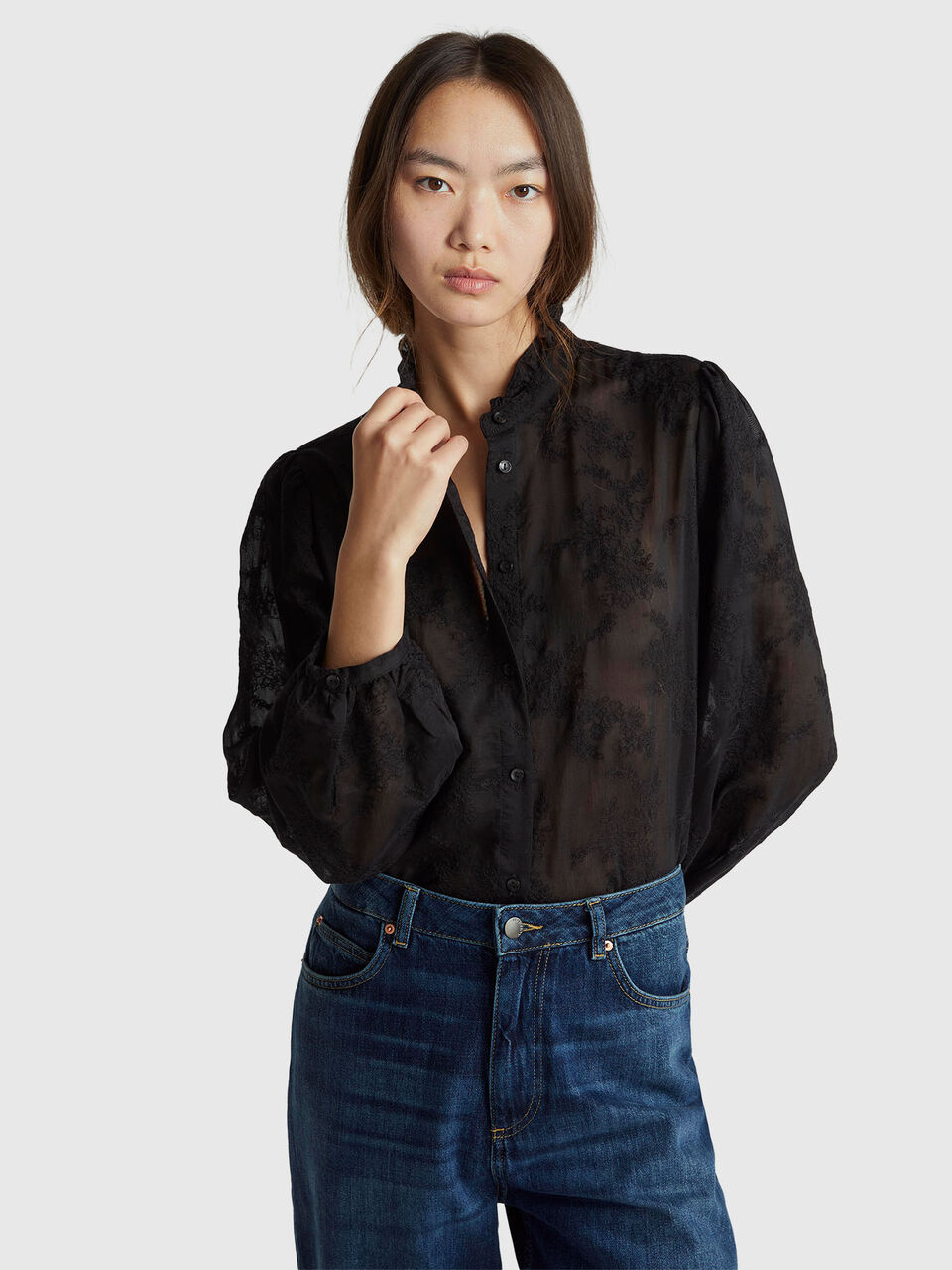 Embroidered blouse with ruffled collar