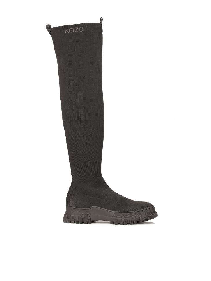 Flexible over the knee boots on a straight sole