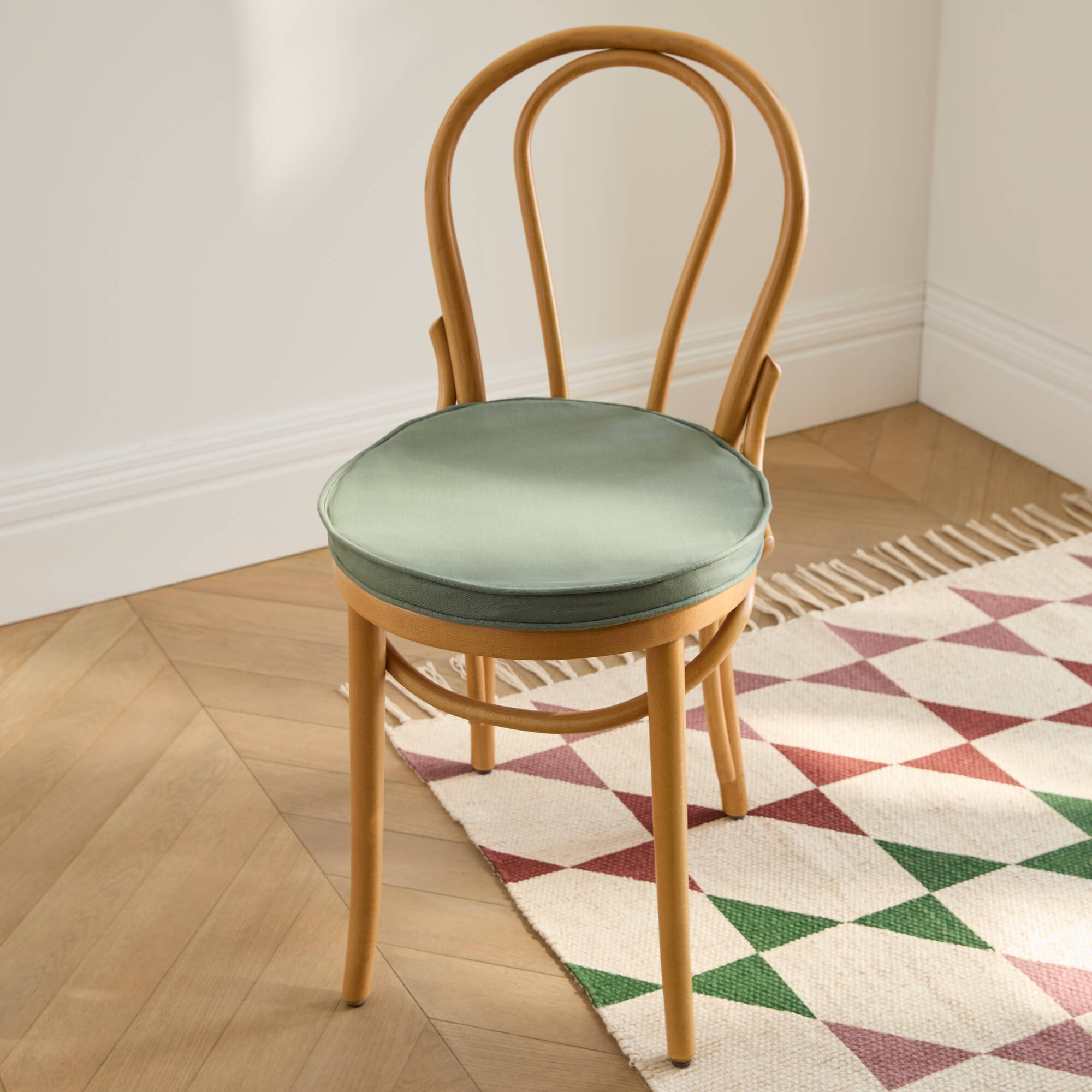 Coussin d'assise uni rond bachette