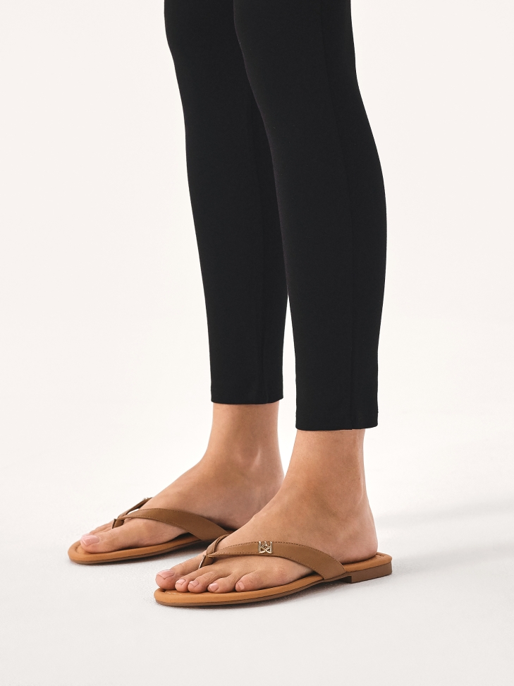 Brown flat flip-flops