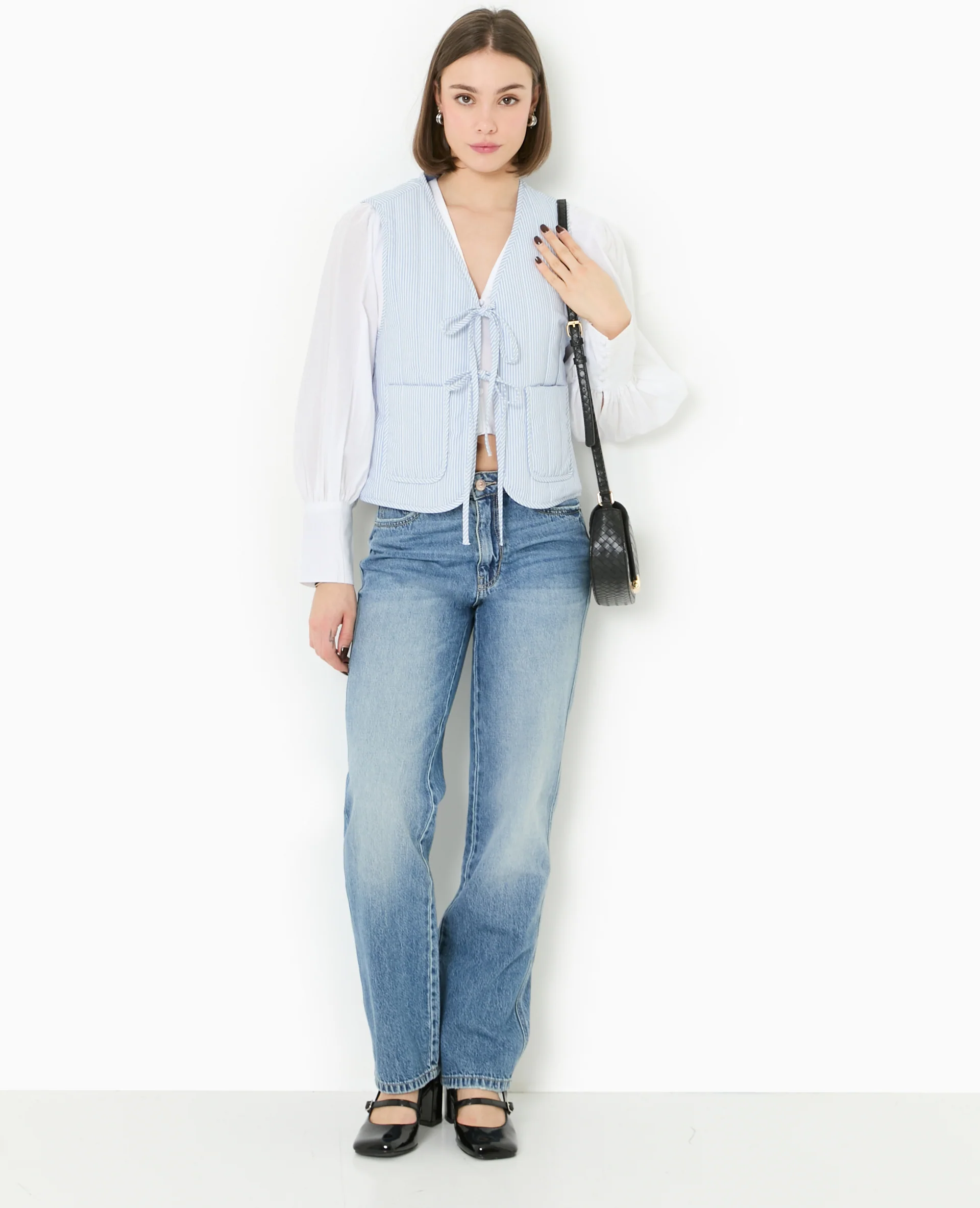 Veste sans manches matelassée avec rayures