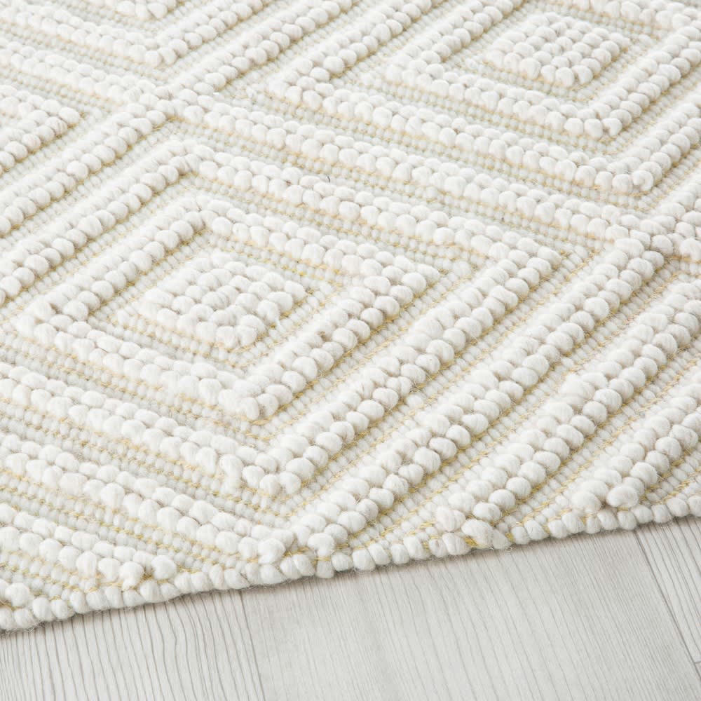 ZEINA - Tapis tissé en laine et coton écru motifs graphiques 140x200