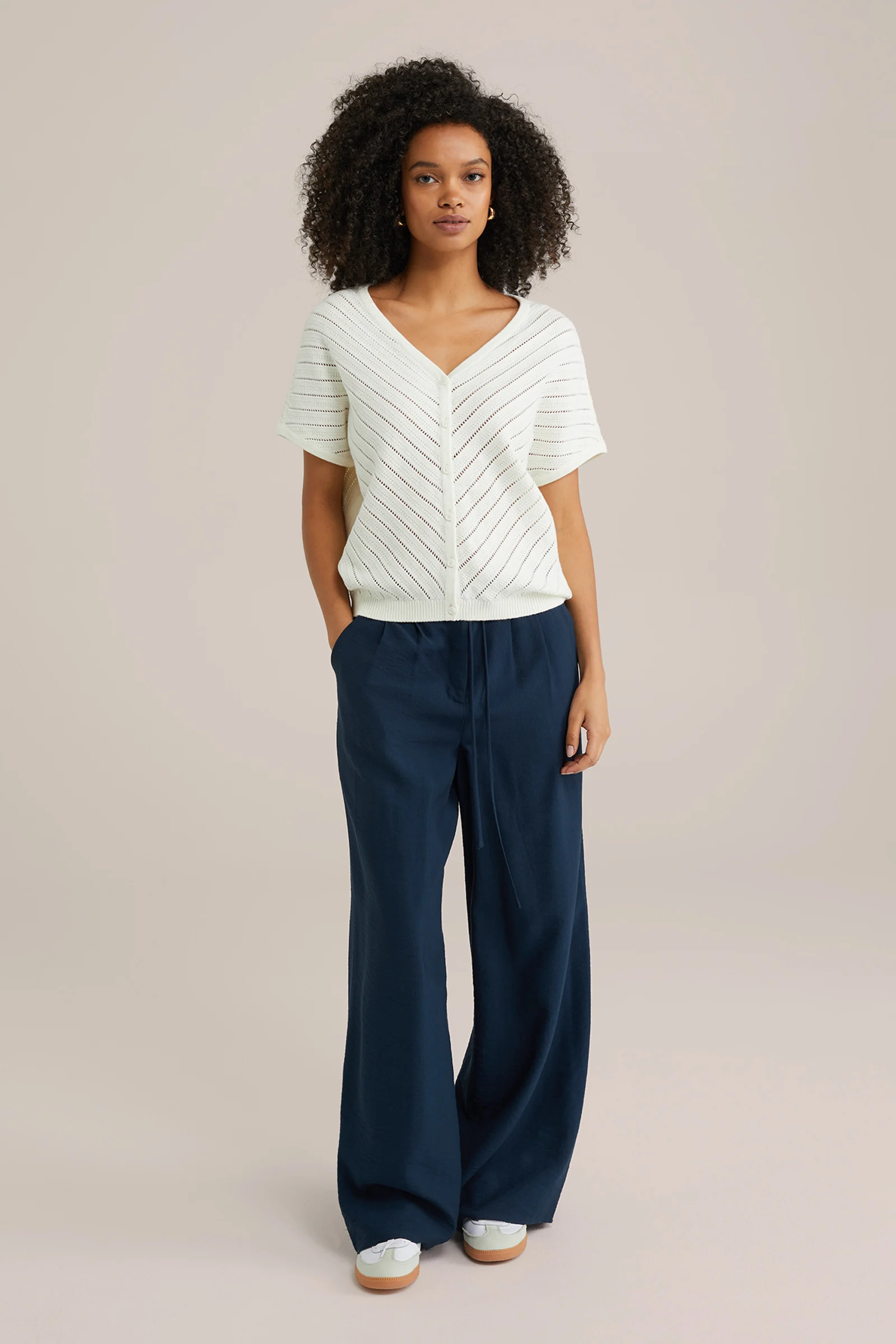 Dames vest met opengewerkte structuur