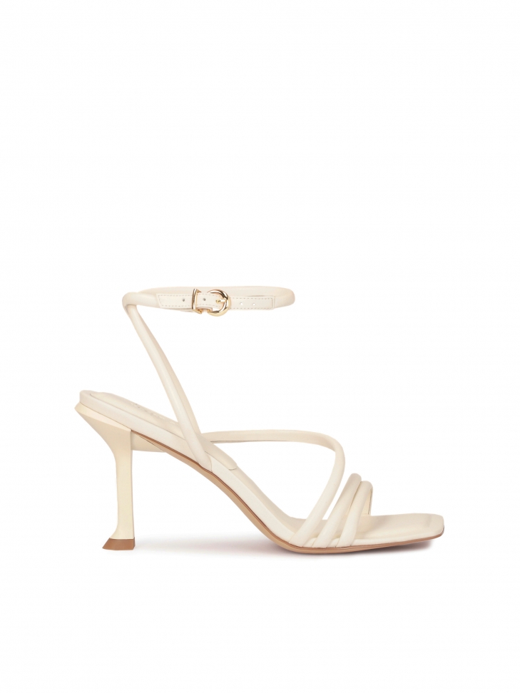 Beige sandals with a fashionable heel