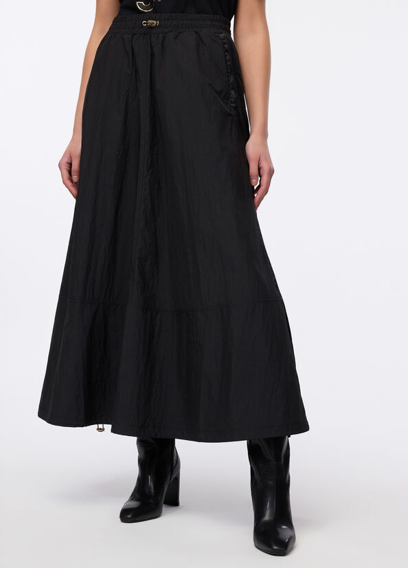 Gonna lunga in nylon e raso