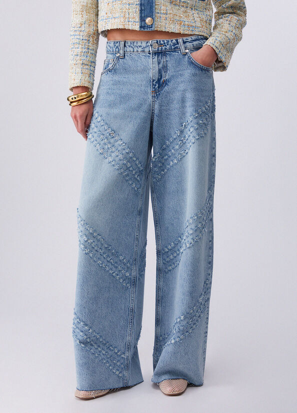 Jeans flare con dettagli laserati