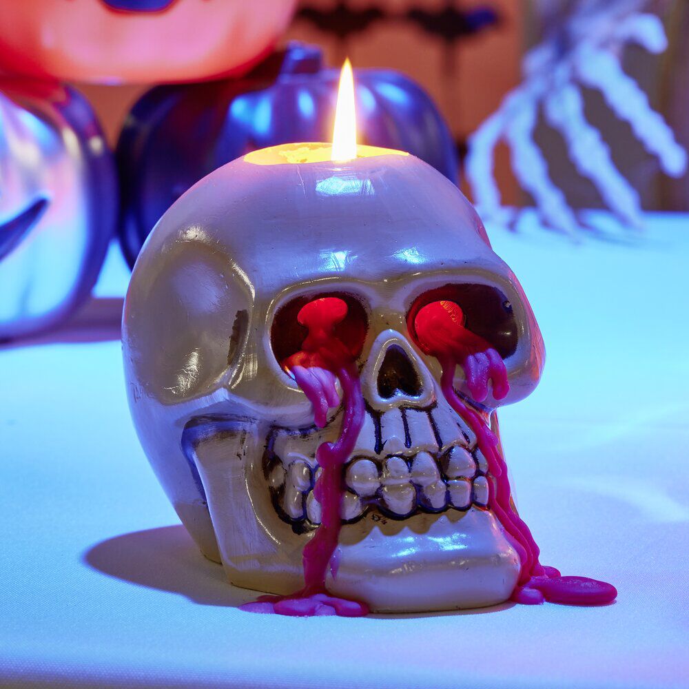 Bougie Halloween tête de mort beige