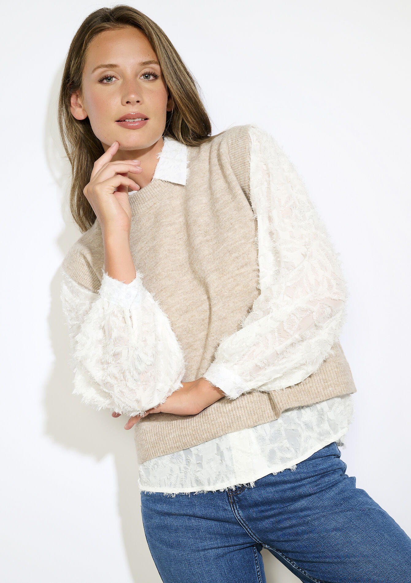 Mouwloze gebreide trui