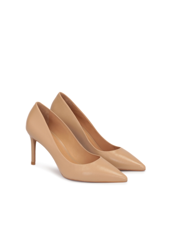 Light brown leather pumps on a sleek heel