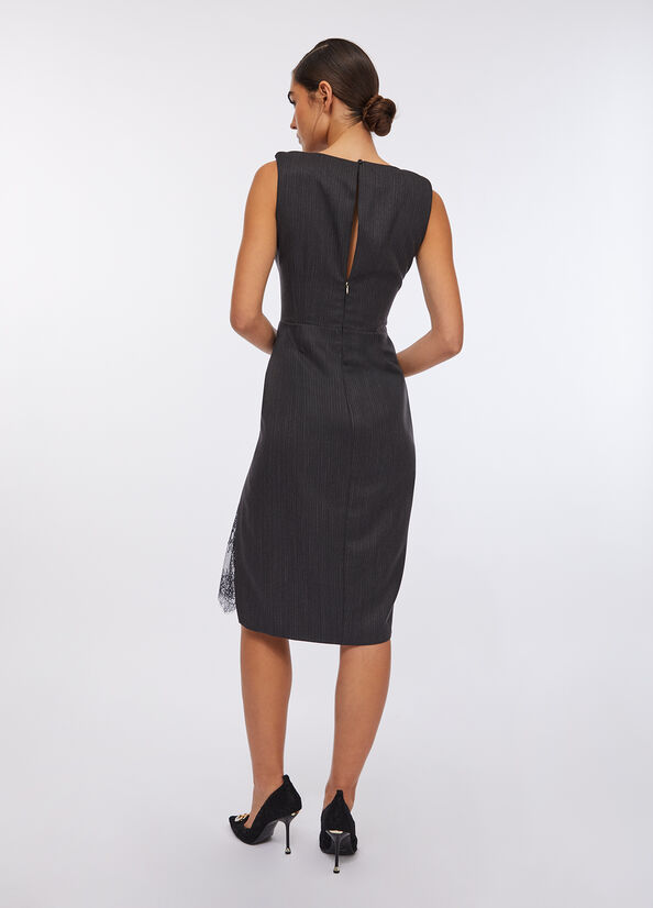 Abito gessato con pizzo