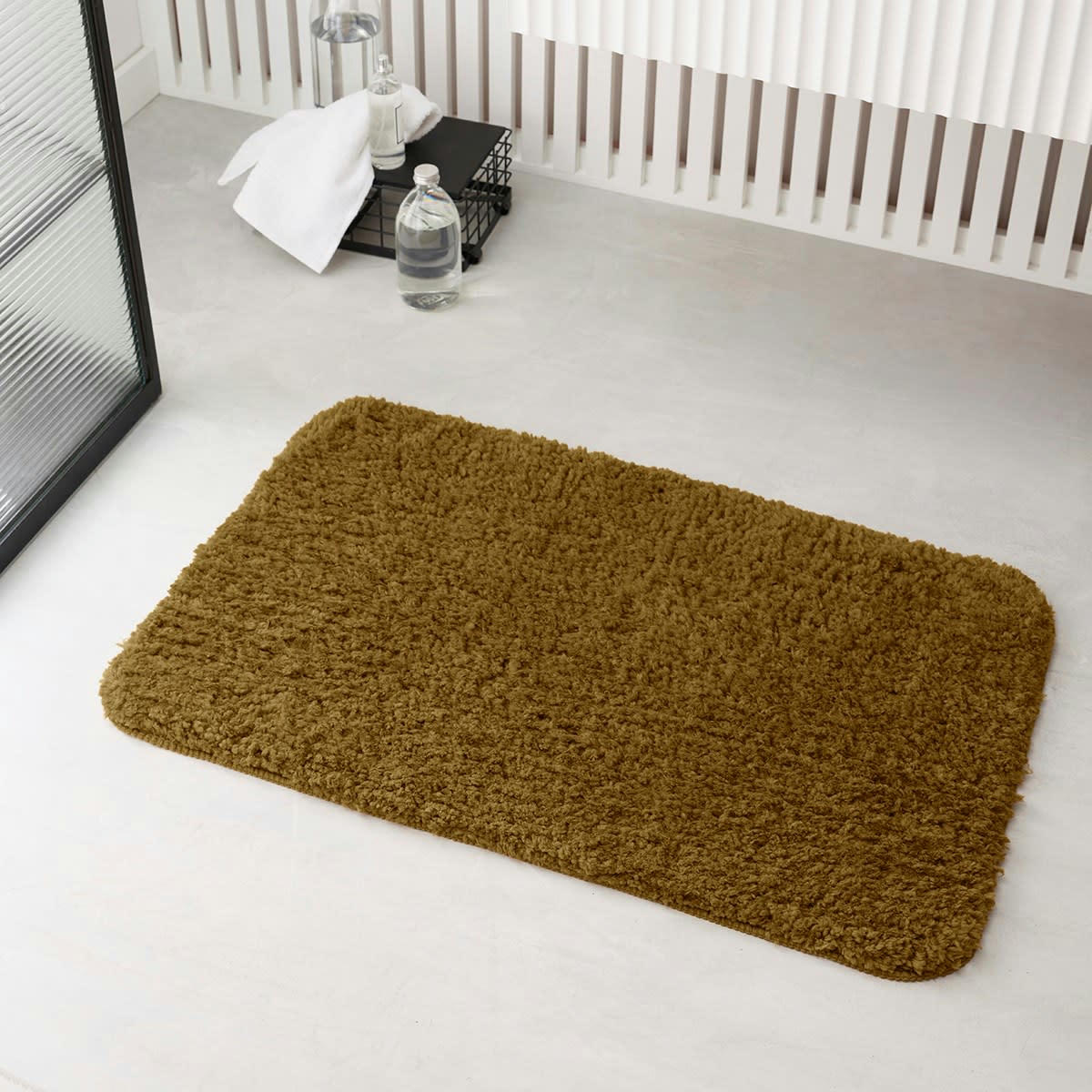 ESSENTIAL - Tapis de bain tufté uni en Polyester Bronze 50x80 cm