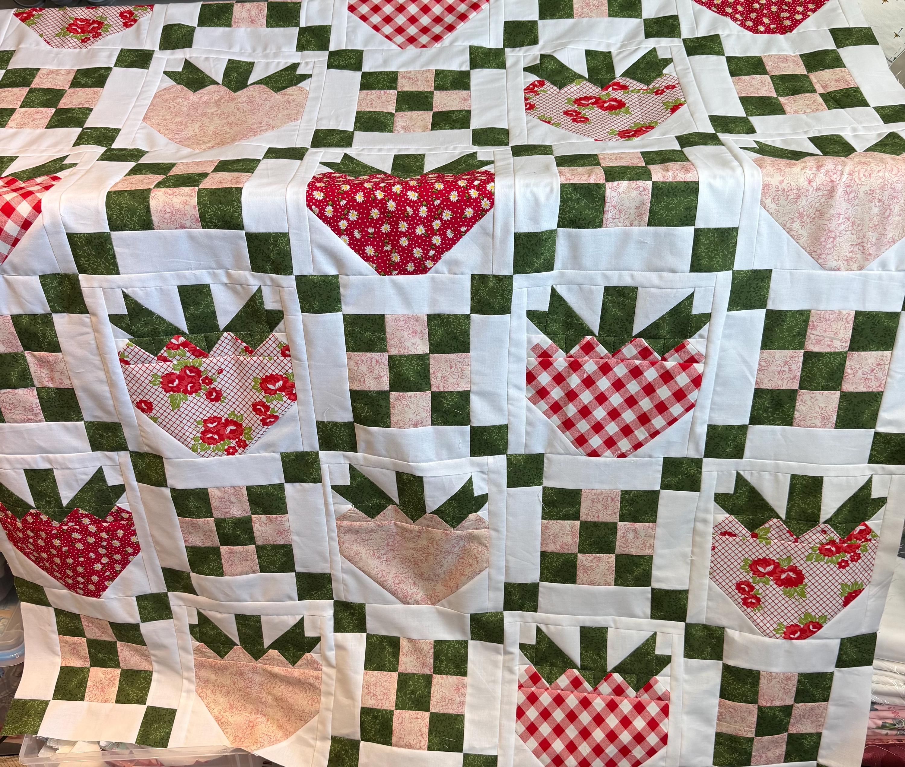 Irish chain strawberries, Hand made by me, machine sewn quilt. Made with 100% new cotton materials. measures 65x54 inches inches