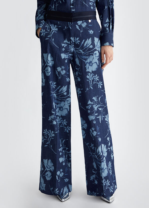 Jeans a palazzo con stampa floreale