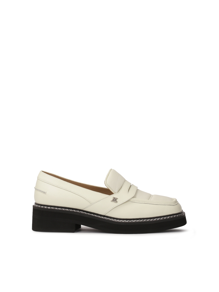 Off-white leather loafers with black sole