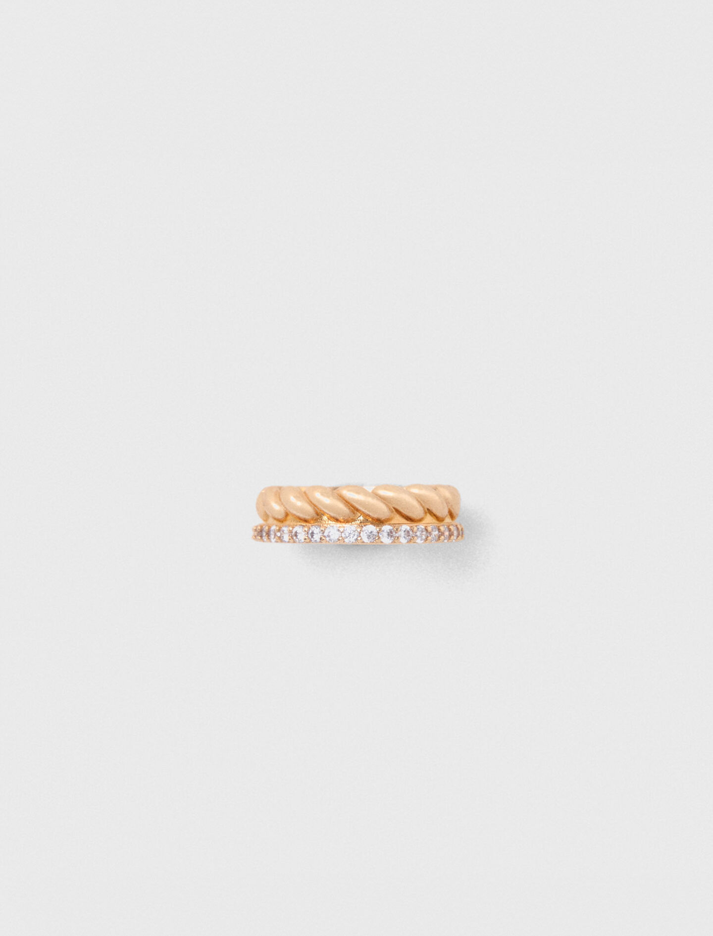 Bague dorée torsadée et strassée