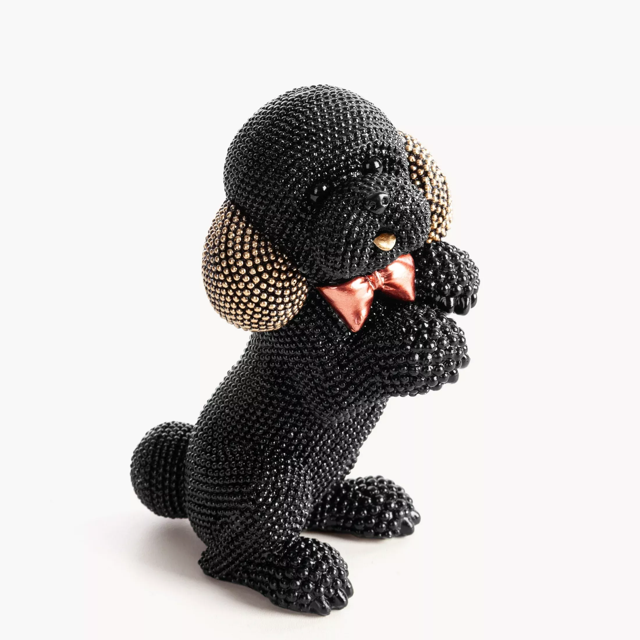 Figurka czarno-złota pieso drobnym strukturalnym wzorze 10x7x15 cm ELDO