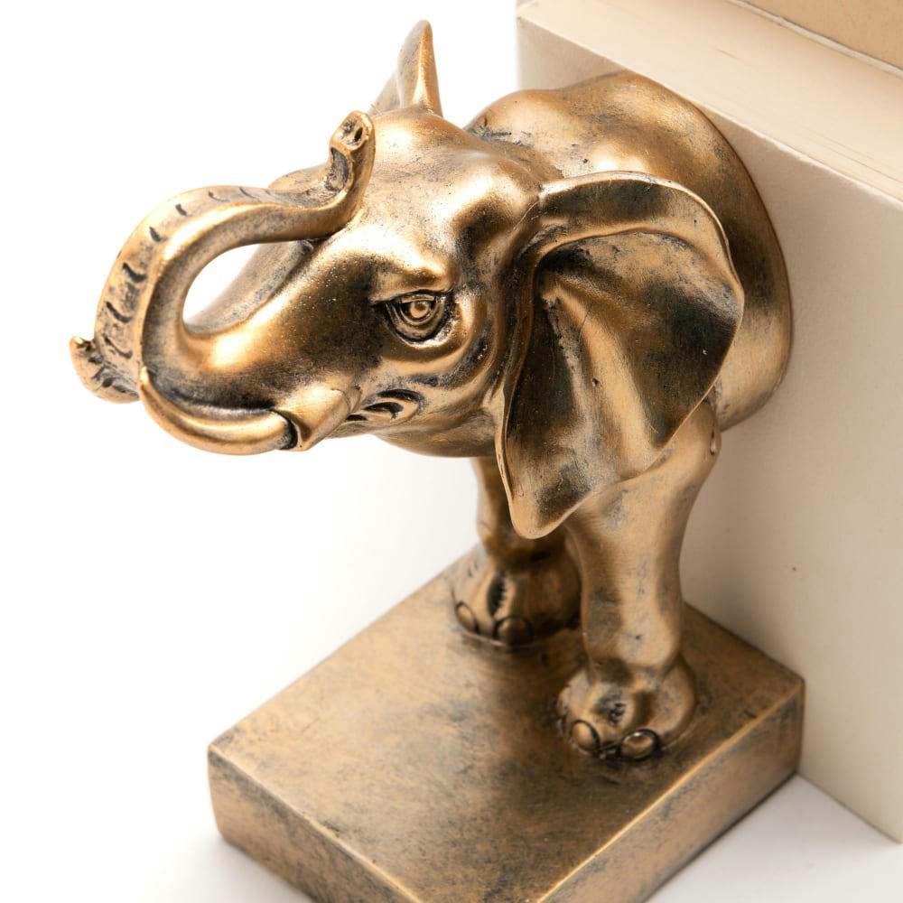 - Serre livre éléphant dé en résine  or