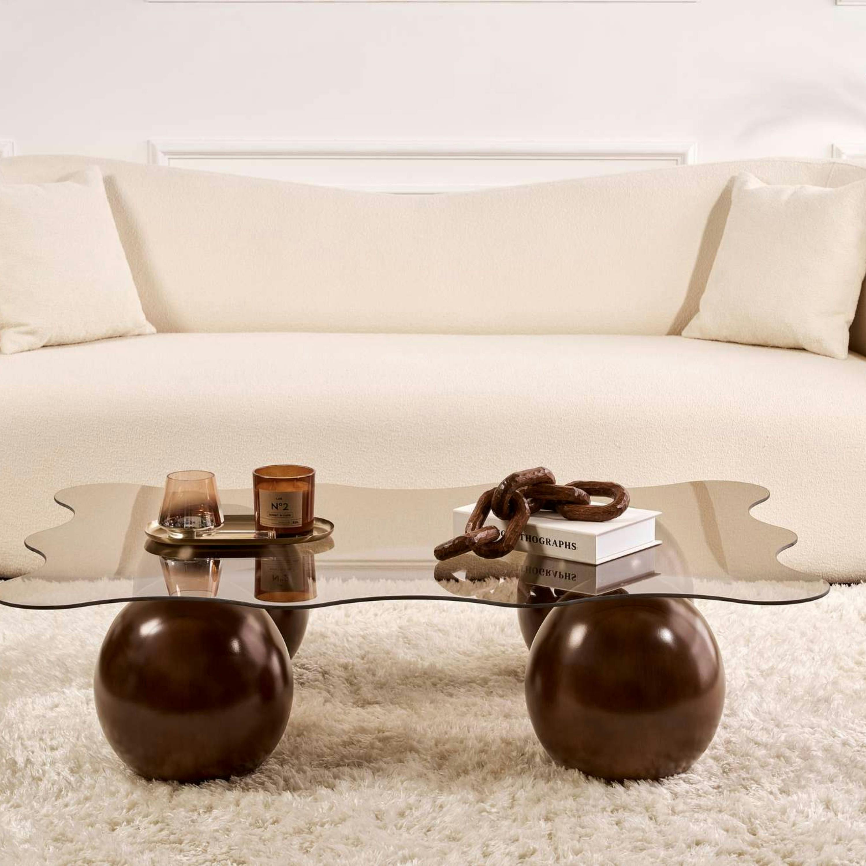 Table basse verre ambré design organique 4 pieds boule KOCHI